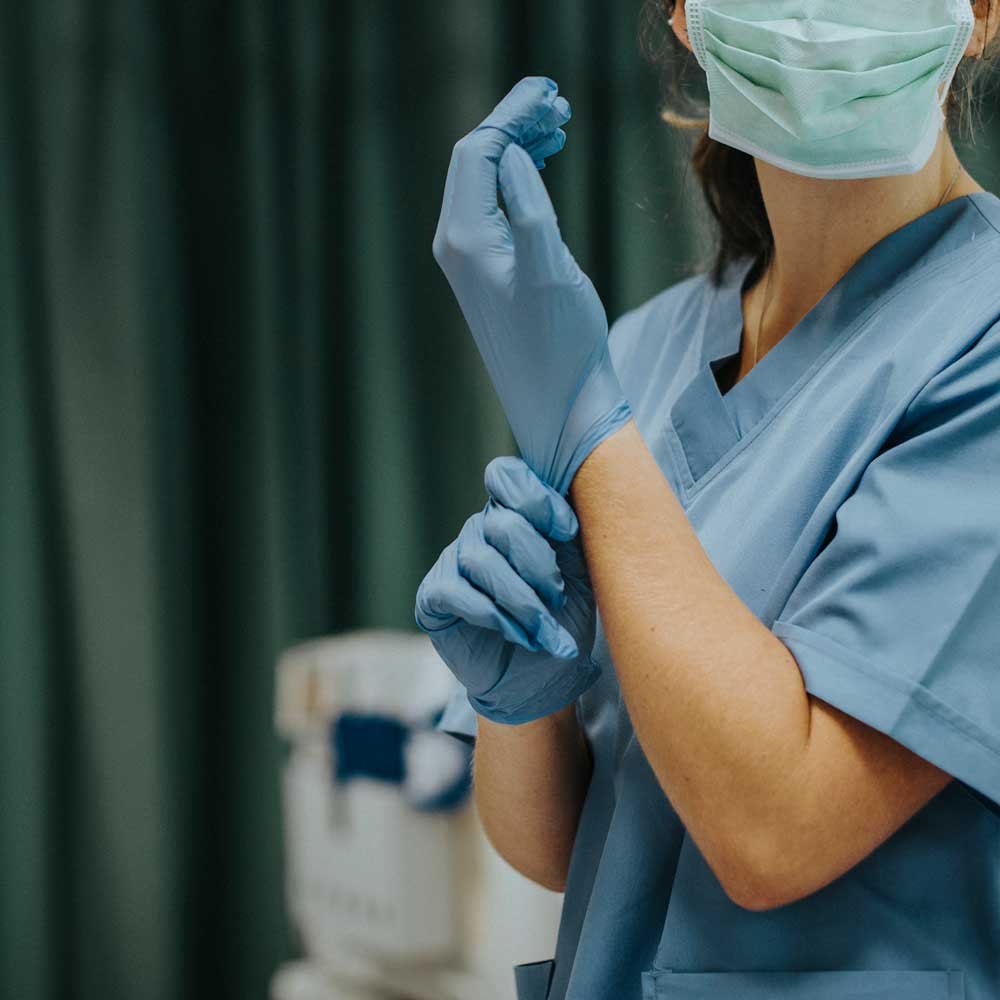 Practitioner with Gloves and mask